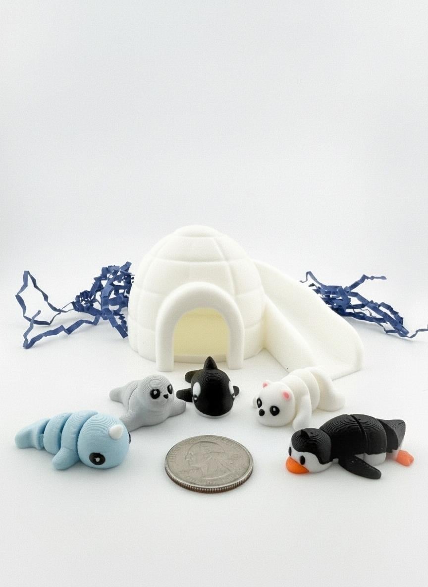 All Igloo Arctic animal figures fitting inside the igloo container for easy cleanup and travel