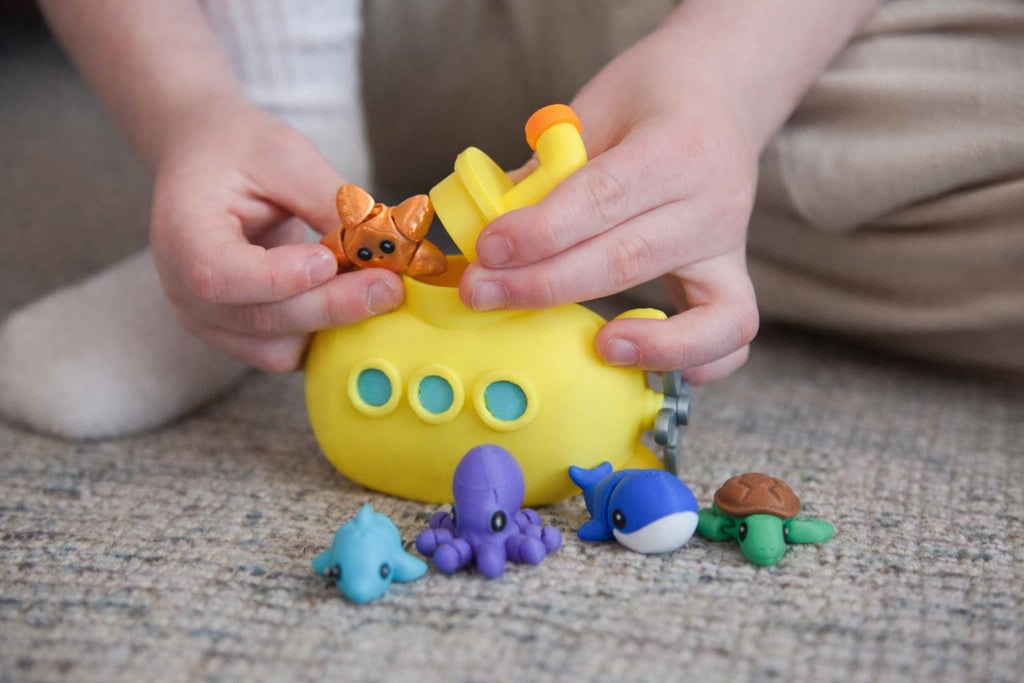 Durable Submarine Ocean CritterPod container open and closed - kid-friendly travel toy design