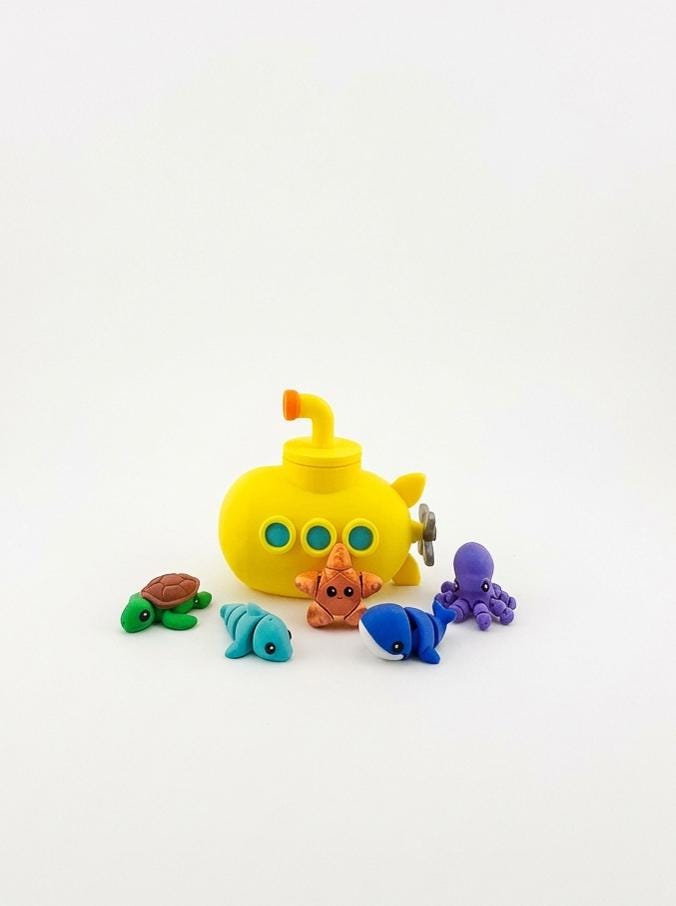 Kids playing with Submarine Ocean CritterPod playset - underwater open-ended play for toddlers