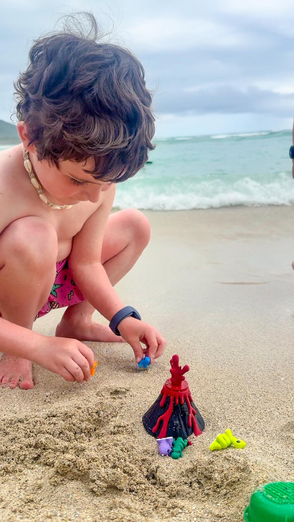 Durable Volcano Dinosaur CritterPod container open and closed - kid-friendly travel toy design